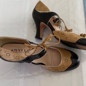 Anyi Lu Black and Tan Perforated Leather Lace-Up Heels